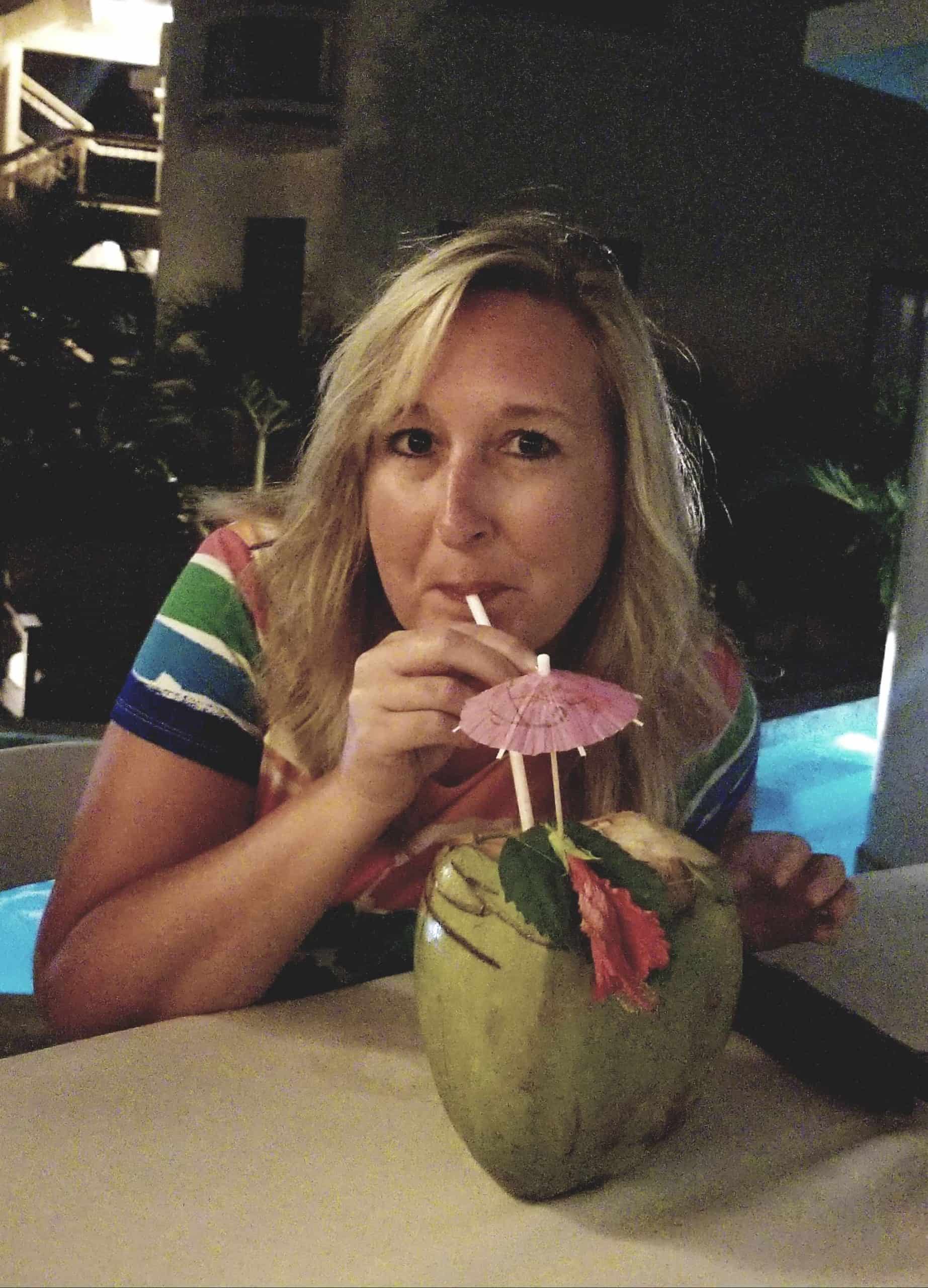 me drinking a coconut drink