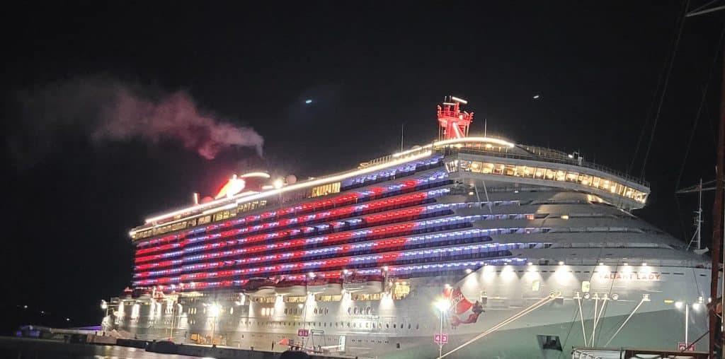 Cruise ship at night with heart St John's on the side