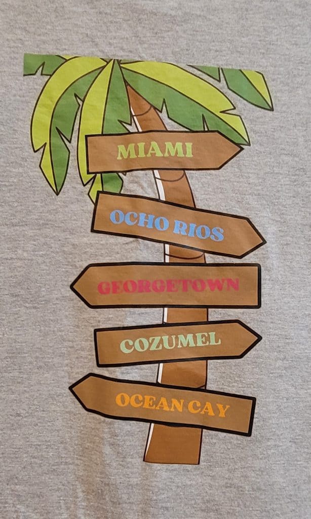 Back of cruise t-shirt that has Miami, Ocho Rios, Georgetown, Cozumel, and Ocean Cay printed on it