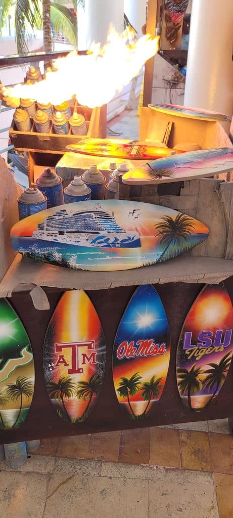 Airbrushed cruise ship on a mini surfboard