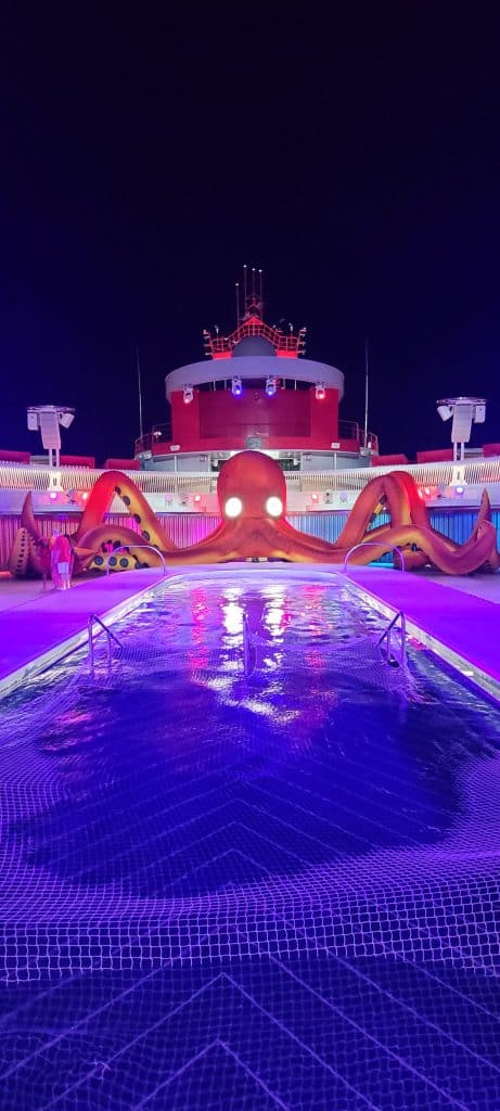 Pool deck with a large blow up octopus