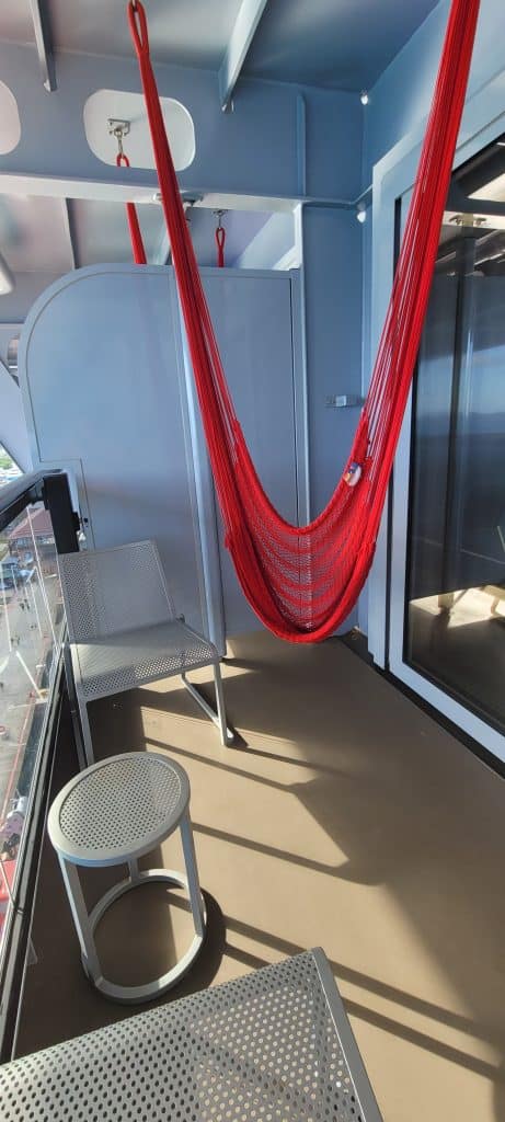 Red hammock on a cruise ship balcony