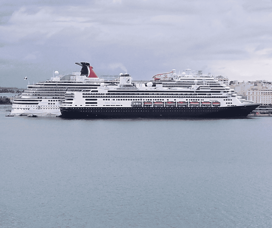Carnival Ship beside a Holland America ship