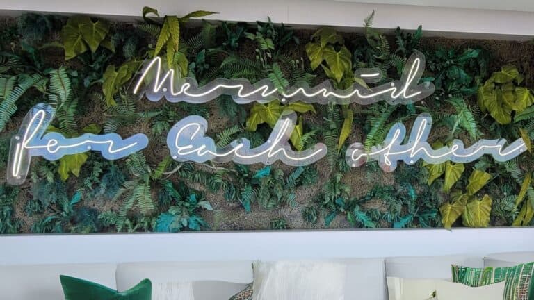 Greenery Background with words that say Mermaid For Each Other