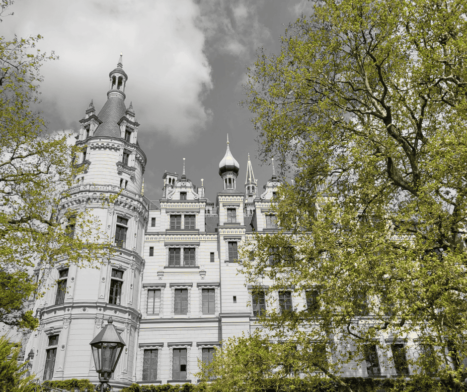 Castle in Germany surrounded by trees, an example of historic landmarks often included on European cruise itineraries.