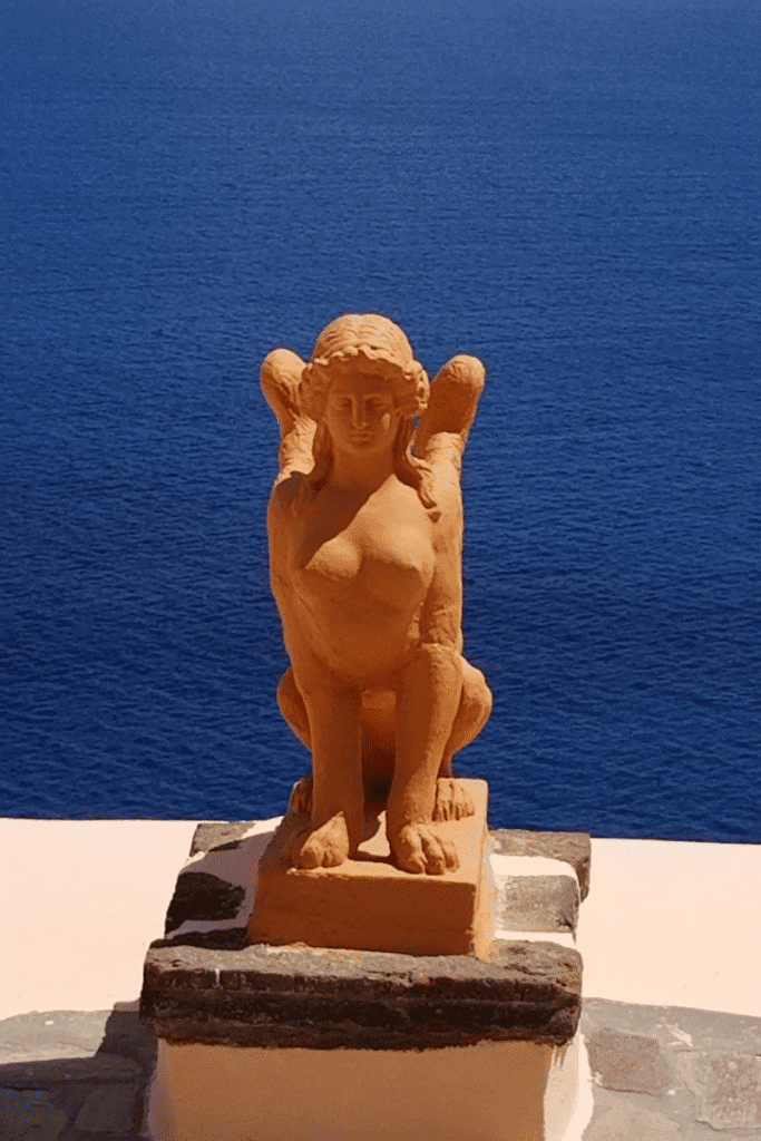 Statue overlooking the deep blue Mediterranean Sea: Europe cruise planning begins here.”