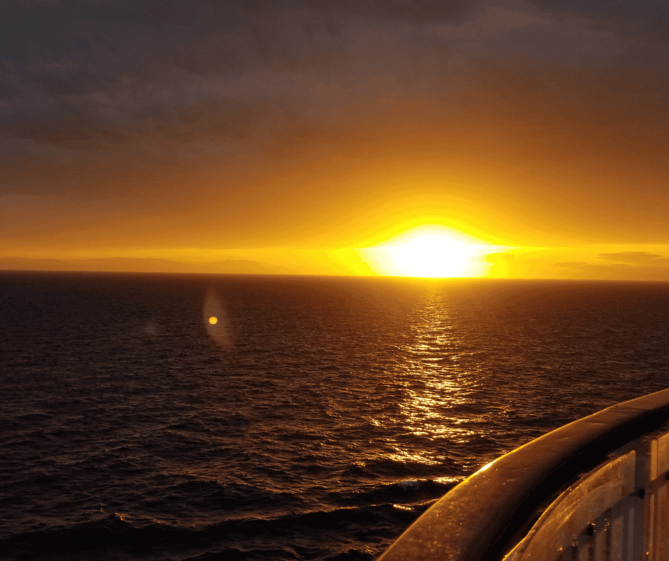 Golden sunset view from a cruise ship deck: the reward after all the preparation.