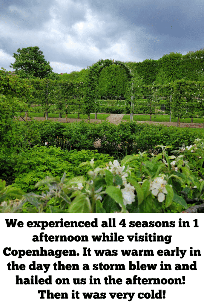 Green gardens in Copenhagen, Denmark, where cruise visitors experienced rapid weather changes in a single afternoon.