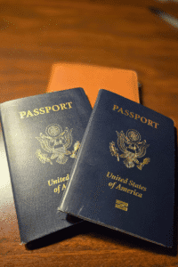 Two U.S. passports and a travel folder — essential for European cruise preparation