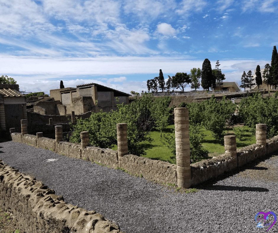 Cobblestone road under blue skies representing Europe’s varied cruise seasons and climates.